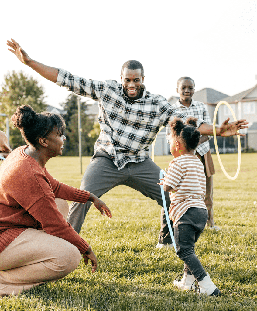 father playing with kids