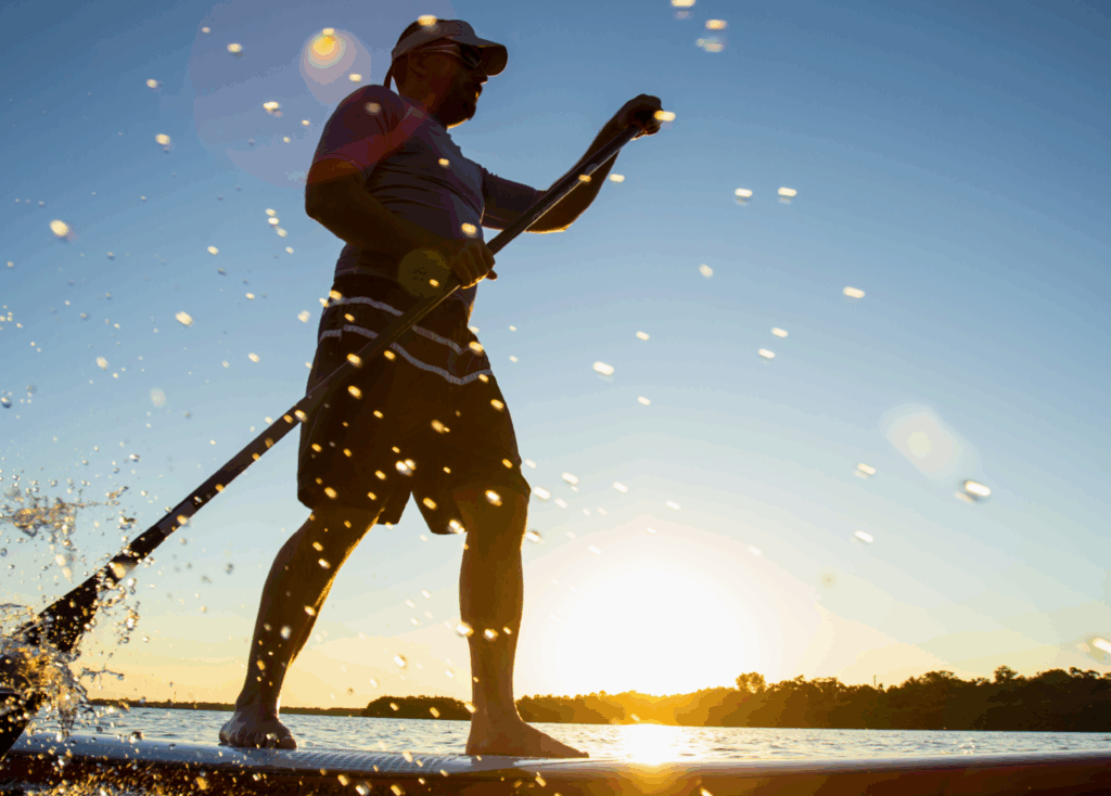 man paddle boarding