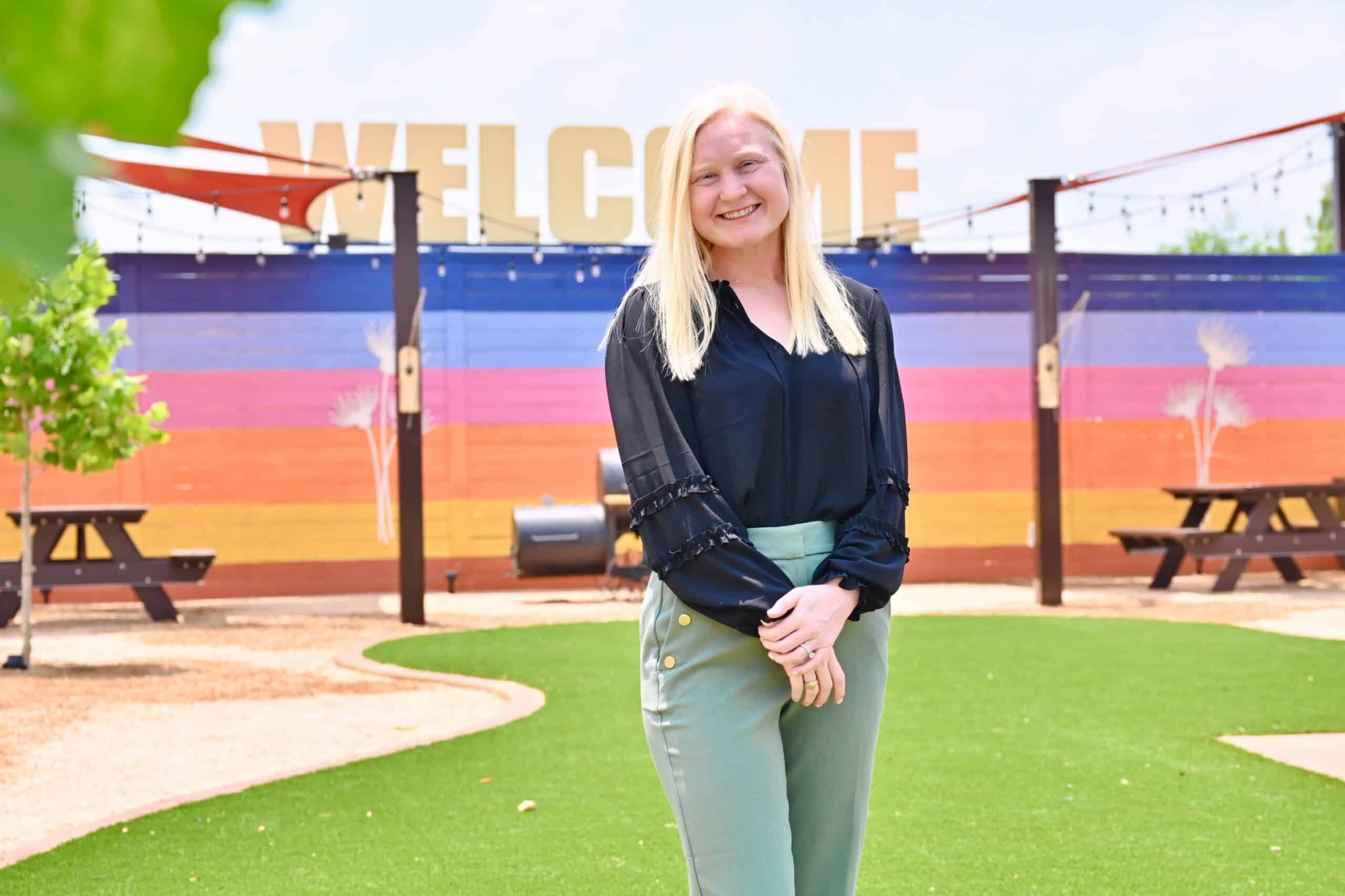 Emily Griner, Lifestyle Director, welcoming residents at a Grand Prairie event